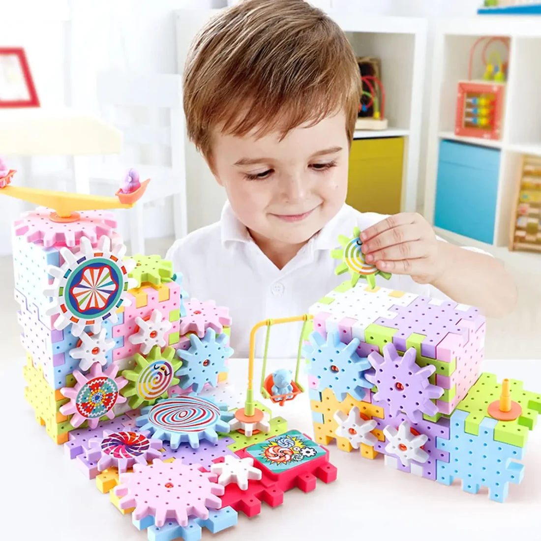 Child playing with colorful gear toys in a bright room